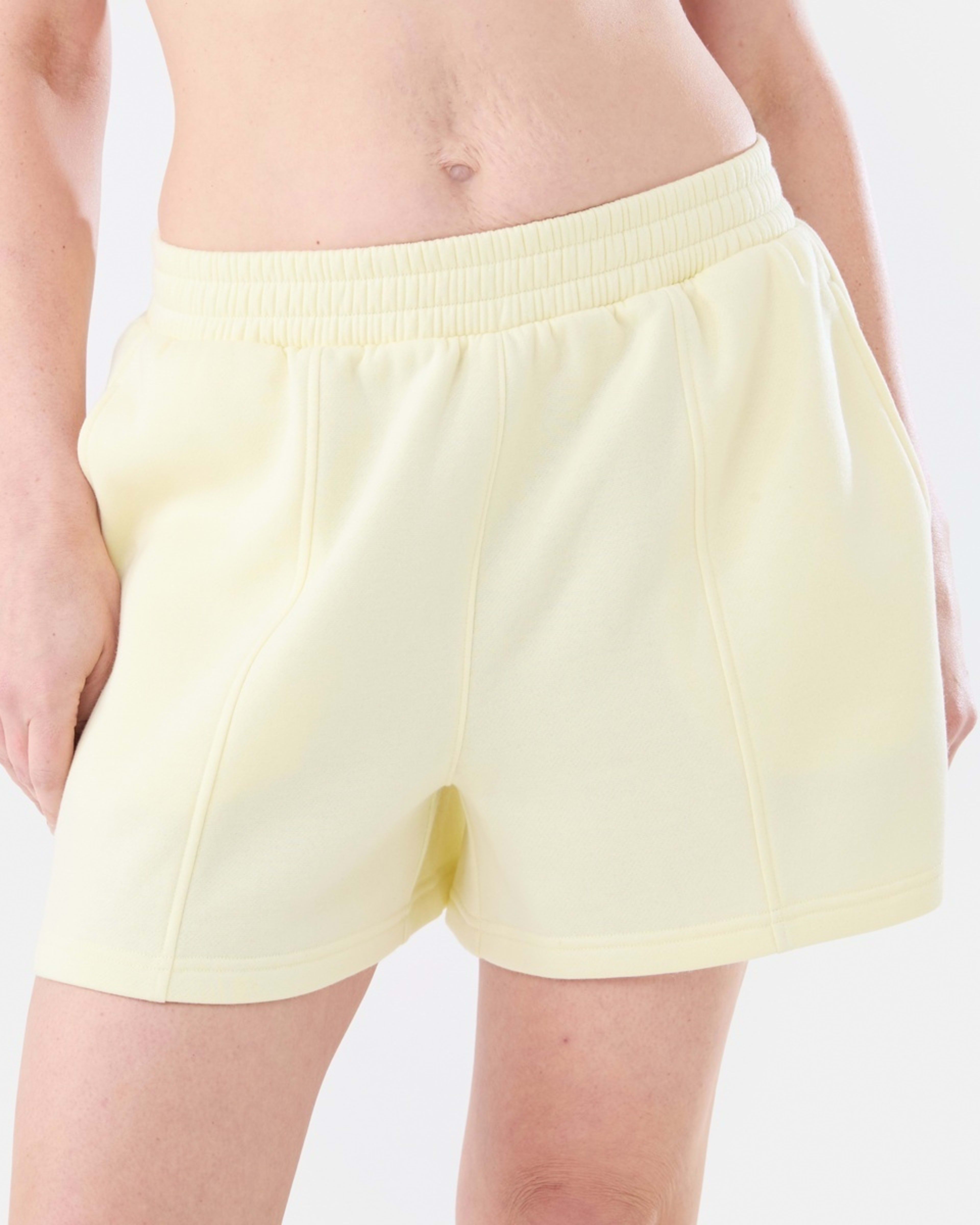 1 Active Womens Front Seam Fleece Shorts LEMON MIST, 1 of 5