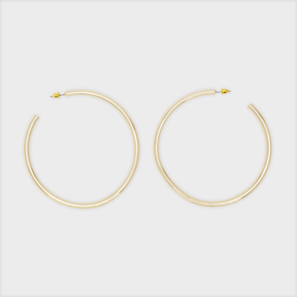 gold wavy hoop earrings